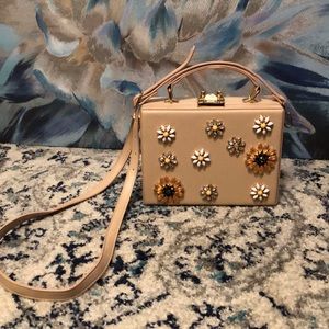 Small, crossbody clutch